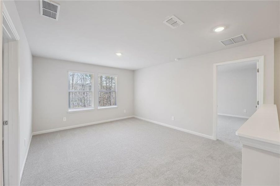 Spacious, unfurnished interior of a new home in Creekside at Oxford Park, Fairburn (Image 32).