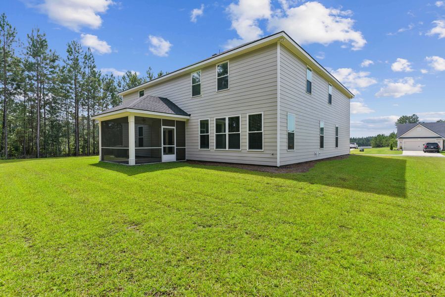 Exterior details and patio area of a home in NorthShore on the St. Marys River, Kingsland (Image 23).