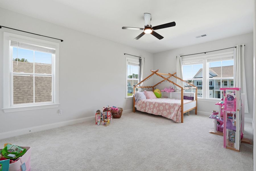 Furnished interior view inside a new home in Tidewater at Lakes of Cane Bay, Summerville (Image 38).