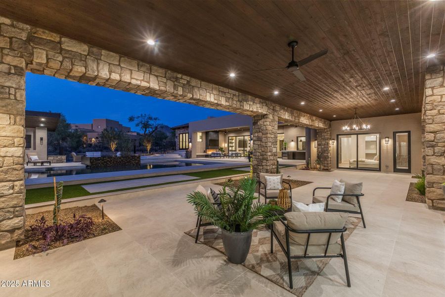 Covered patio leading to RV garage