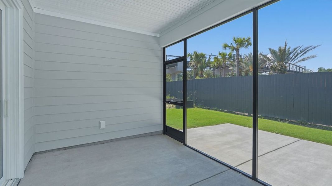 Exterior details and patio area of a home in Sun City Hilton Head, Bluffton (Image 26).