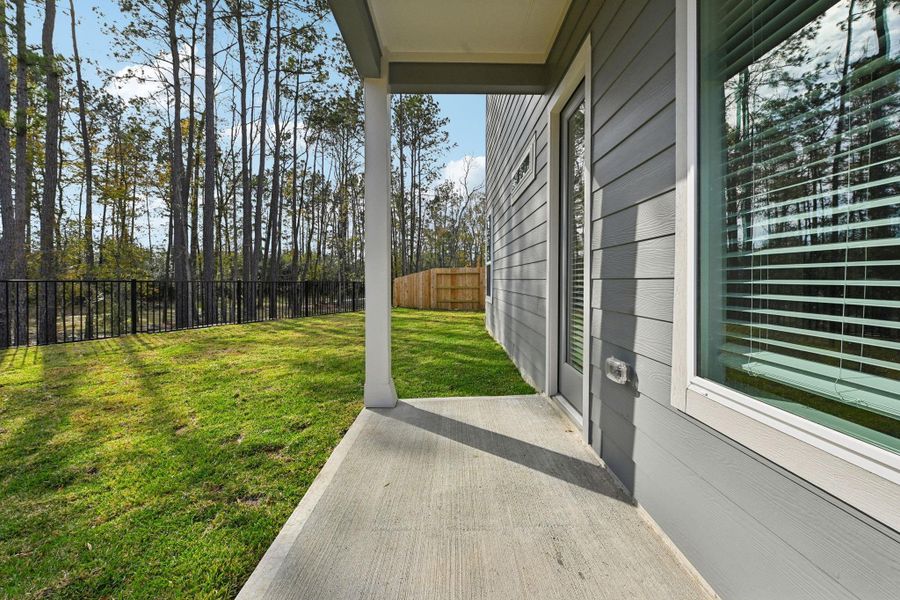Exterior details and patio area of a home in Pinewood Trails - Luxe Series, Atascocita (Image 26). Exterior details and patio area of a home in Pinewood Trails - Luxe Series, Atascocita (Image 26).