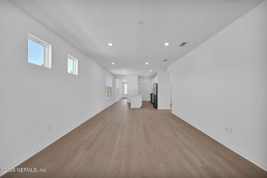 Spacious, unfurnished interior of a new home in Del Webb Wildlight, Yulee (Image 18).