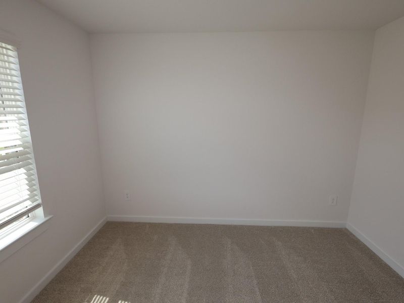 Spacious, unfurnished interior of a new home in Pinewood at Grand Texas, New Caney (Image 19).