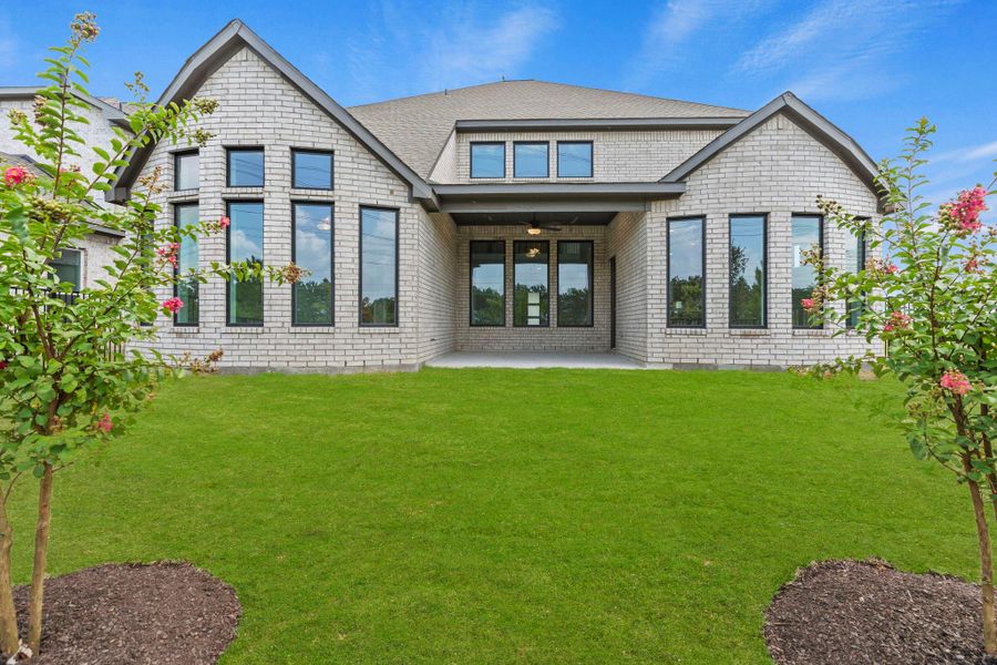Exterior details and patio area of a home in Bridgeland, Cypress (Image 4).