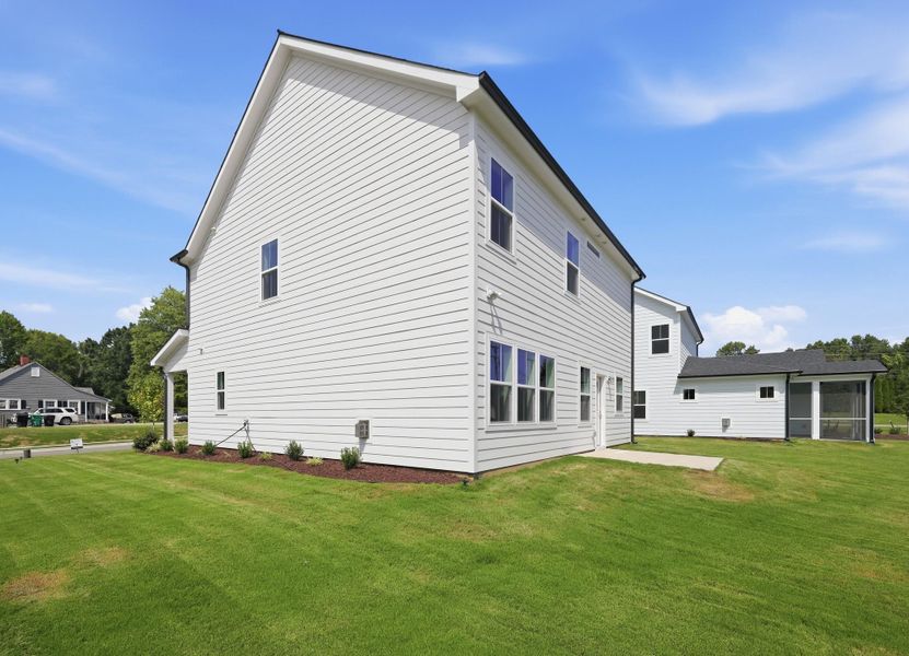 Exterior details and patio area of a home in Golden Gate, High Point (Image 23).