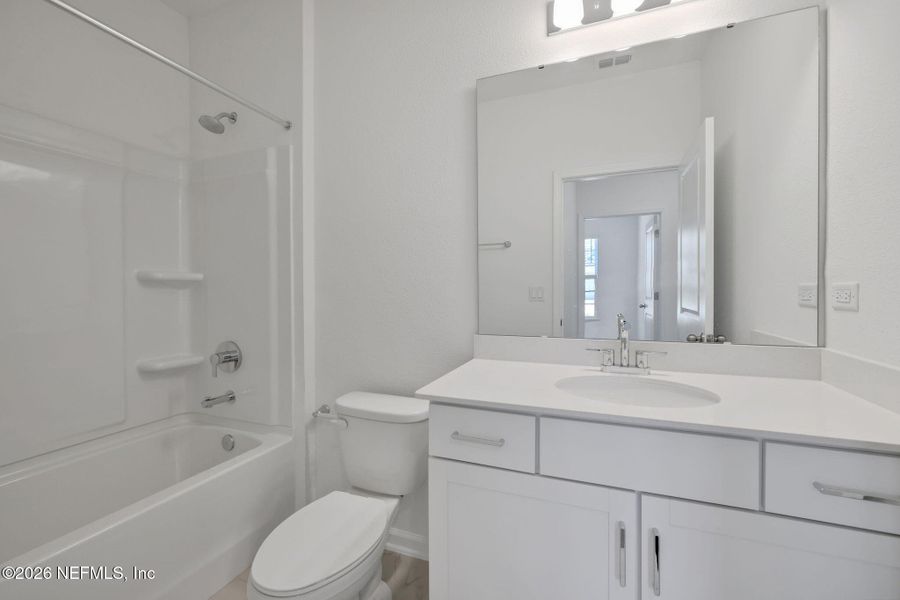 Furnished interior view inside a new home in Hyland Trail, Green Cove Springs (Image 31).