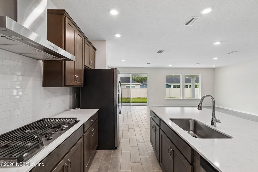 Furnished interior view inside a new home in Tributary 50', Yulee (Image 11).