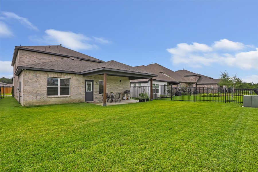 Exterior details and patio area of a home in , Houston (Image 22). Exterior details and patio area of a home in , Houston (Image 22).