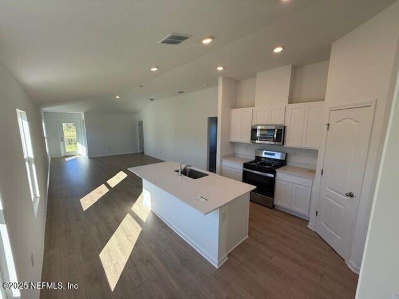 Furnished interior view inside a new home in Grand Reserve, Bunnell (Image 7).
