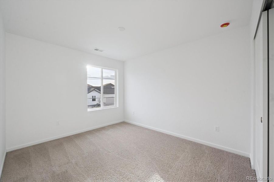 Spacious, unfurnished interior of a new home in Fossil Creek, Windsor (Image 17).