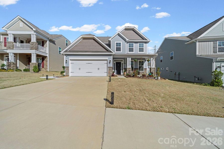Front exterior of a new home in , Charlotte, NC, highlighting curb appeal (Image 2). Front exterior of a new home in , Charlotte, NC, highlighting curb appeal (Image 2).