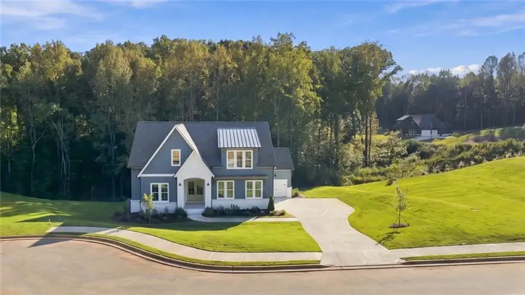 Front exterior of a new home in , Gainesville, GA, highlighting curb appeal (Image 2). Front exterior of a new home in , Gainesville, GA, highlighting curb appeal (Image 2).