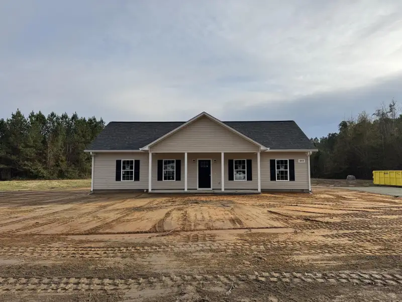 Front exterior of a new home in , St. George, SC, highlighting curb appeal (Image 1). Front exterior of a new home in , St. George, SC, highlighting curb appeal (Image 1).