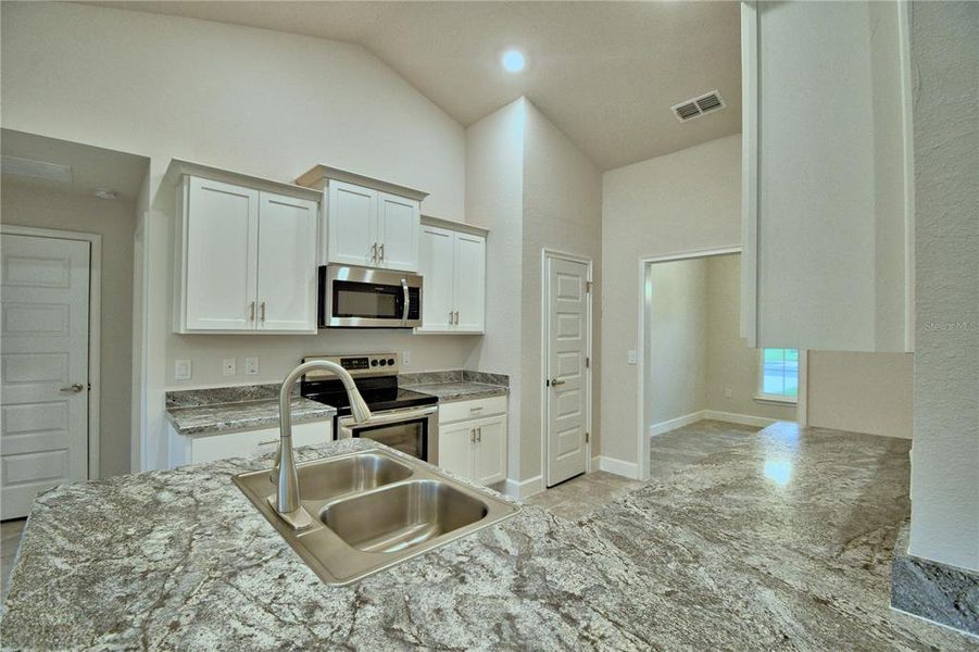 Furnished interior view inside a new home in Cadence Crossing, Auburndale (Image 7). Furnished interior view inside a new home in Cadence Crossing, Auburndale (Image 7).