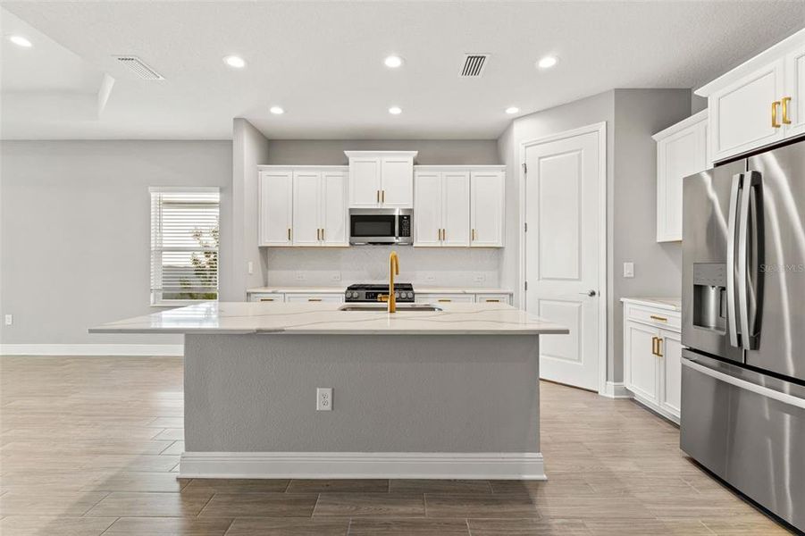 Furnished interior view inside a new home in Palm Grove, Lakewood Ranch (Image 8). Furnished interior view inside a new home in Palm Grove, Lakewood Ranch (Image 8).