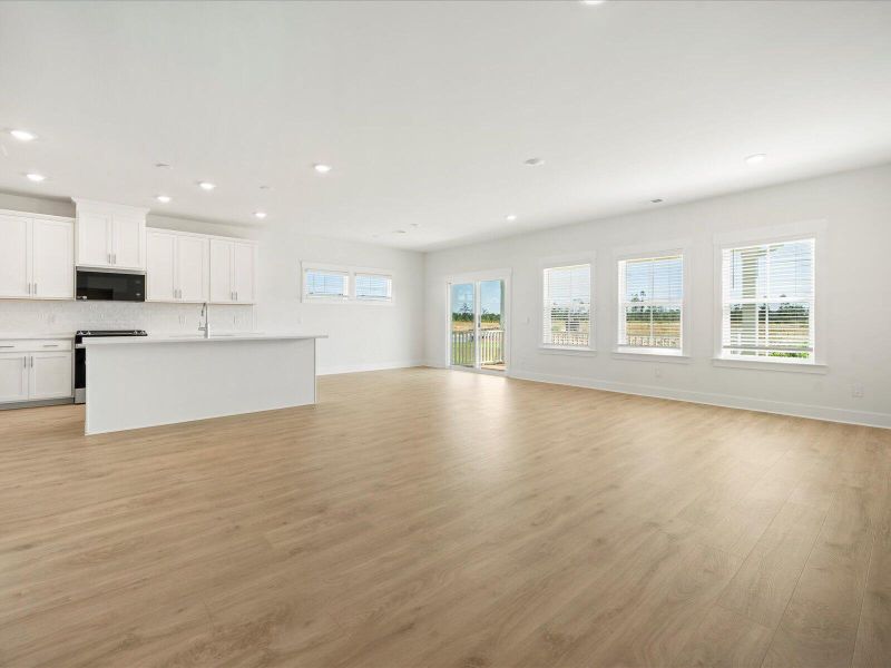 Spacious, unfurnished interior of a new home in The Coves at Lakes of Cane Bay, Summerville (Image 20).