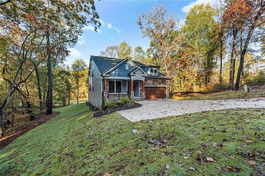 Front exterior of a new home in Cross Creek Plantation, Seneca, SC, highlighting curb appeal (Image 22).