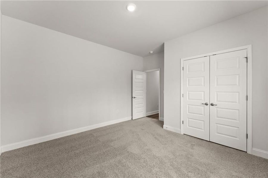 Spacious, unfurnished interior of a new home in Wood Creek Landing, Leland (Image 27).