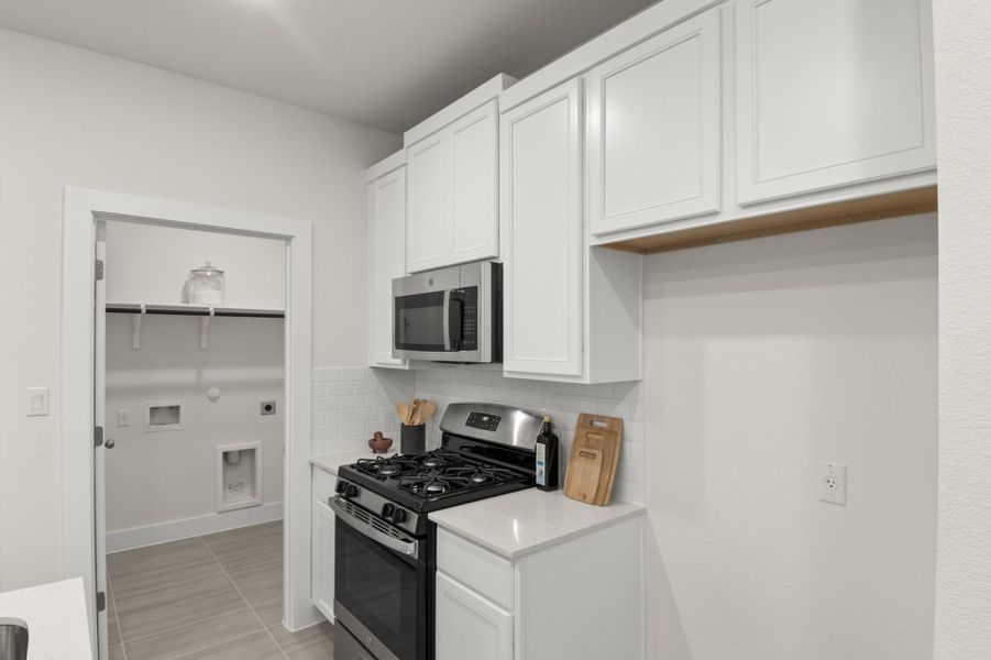 Representative furnished interior of a home built from the Brazos by Pacesetter Homes in Saddle Creek Twinhomes, Georgetown (Image 21).