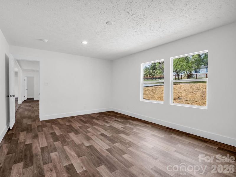 Spacious, unfurnished interior of a new home in , East Flat Rock (Image 29).
