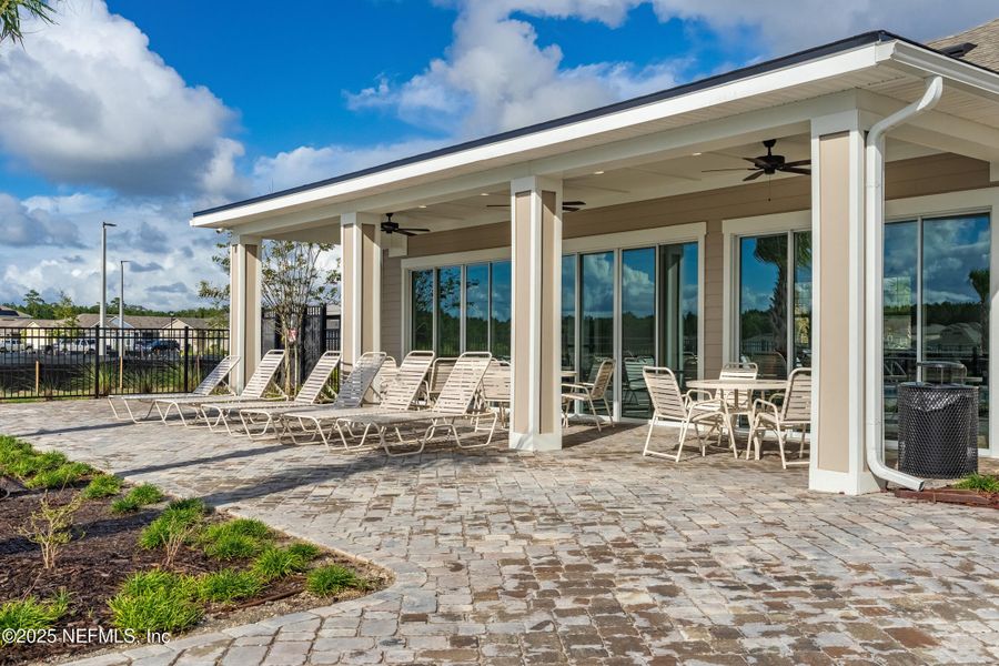 Exterior details and patio area of a home in The Arbors, Jacksonville (Image 1).