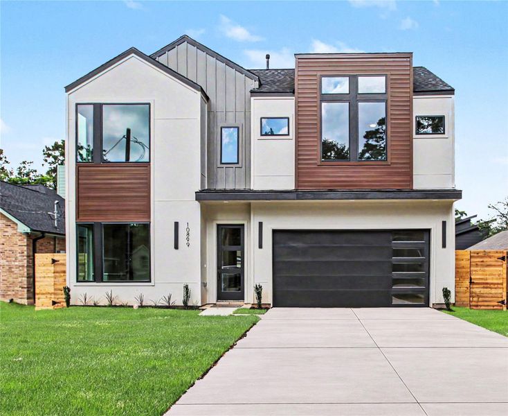 Front exterior of a new home in , Conroe, TX, highlighting curb appeal (Image 23).