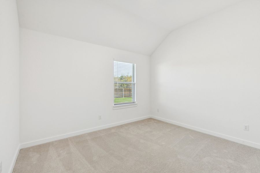 Bedroom in the Gilmour II home plan by Trophy Signature Homes – REPRESENTATIVE PHOTO