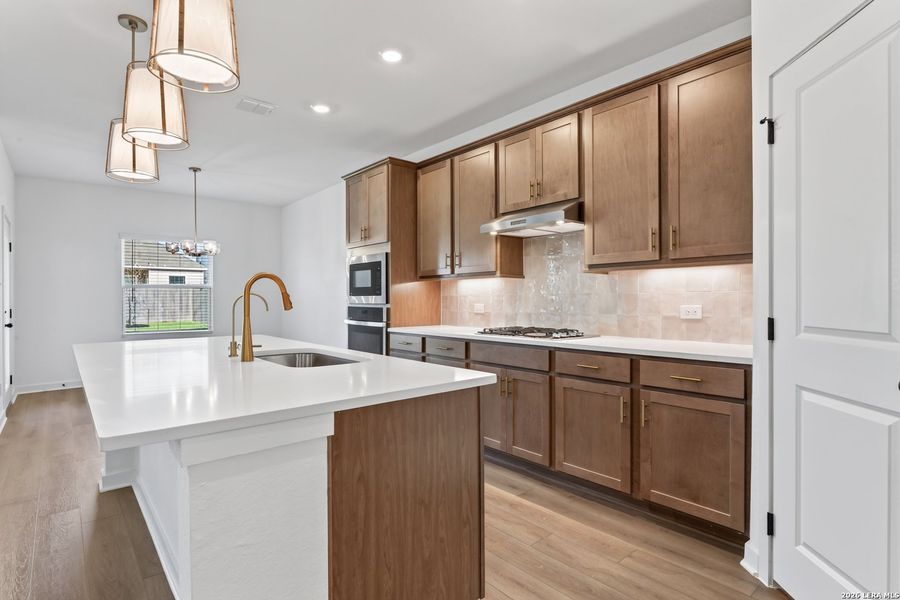 Furnished interior view inside a new home in Nopal Valley, San Antonio (Image 8).