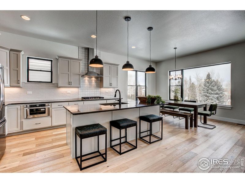 Bright and Spacious Kitchen w/ designer finishes throughout!