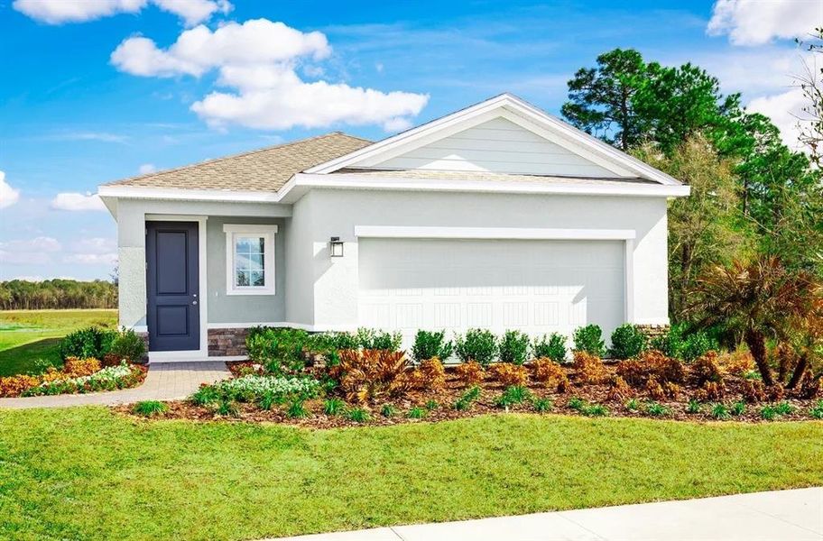 Front exterior of a new home in Cypress Ridge Ranch, Wimauma, FL, highlighting curb appeal (Image 1). Front exterior of a new home in Cypress Ridge Ranch, Wimauma, FL, highlighting curb appeal (Image 1).