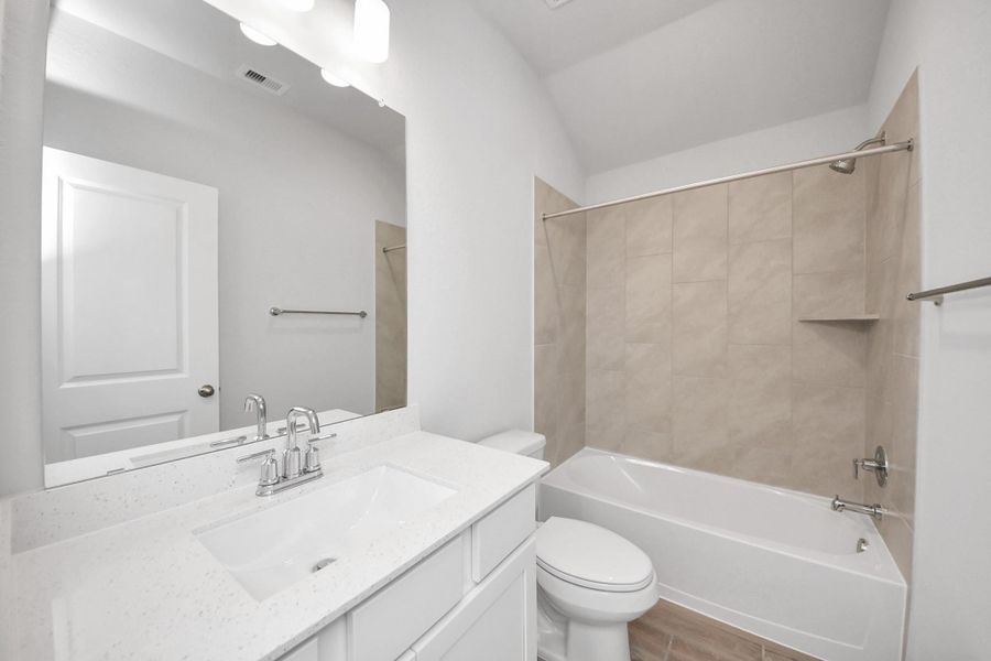 Furnished interior view inside a new home in Sunrise Cove: Landmark Collection, Texas City (Image 7).