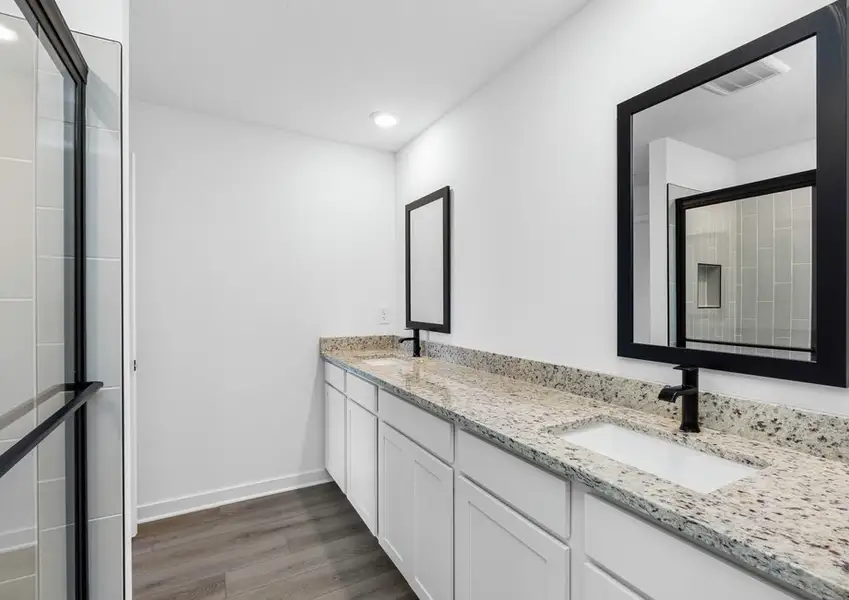 Get ready for your day in this master bathroom