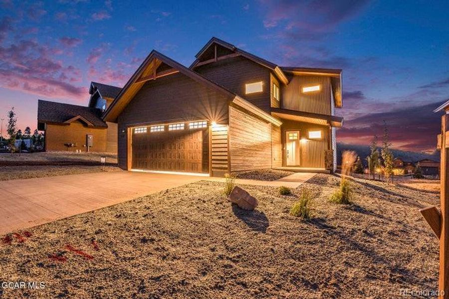 Front exterior of a new home in , Granby, CO, highlighting curb appeal (Image 21).