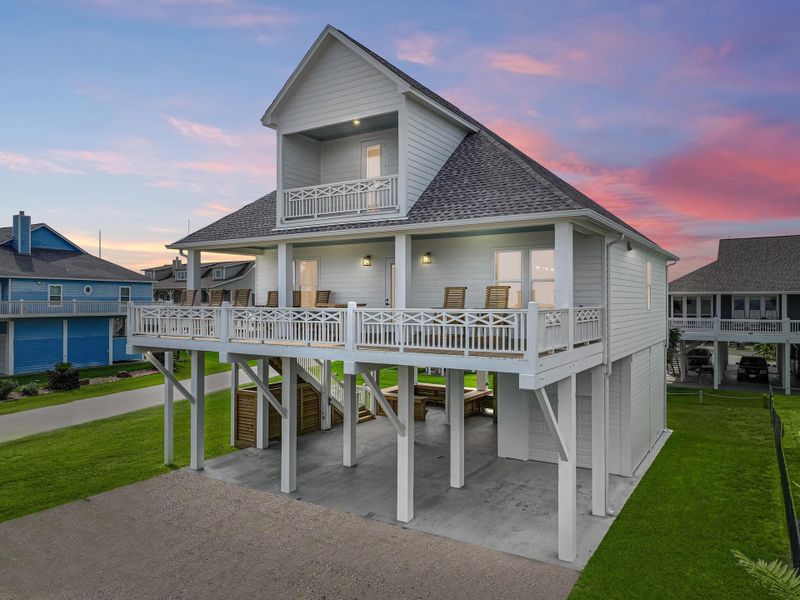 Front exterior of a new home in , Bolivar Peninsula, TX, highlighting curb appeal (Image 26). Front exterior of a new home in , Bolivar Peninsula, TX, highlighting curb appeal (Image 26).
