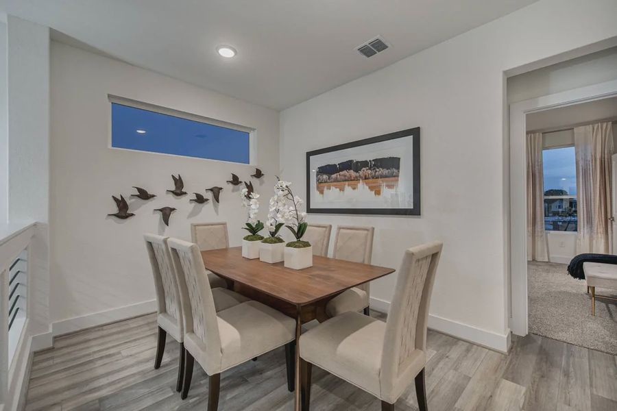 Furnished interior view inside a new home in Centero at Stone Oak, San Antonio (Image 4).