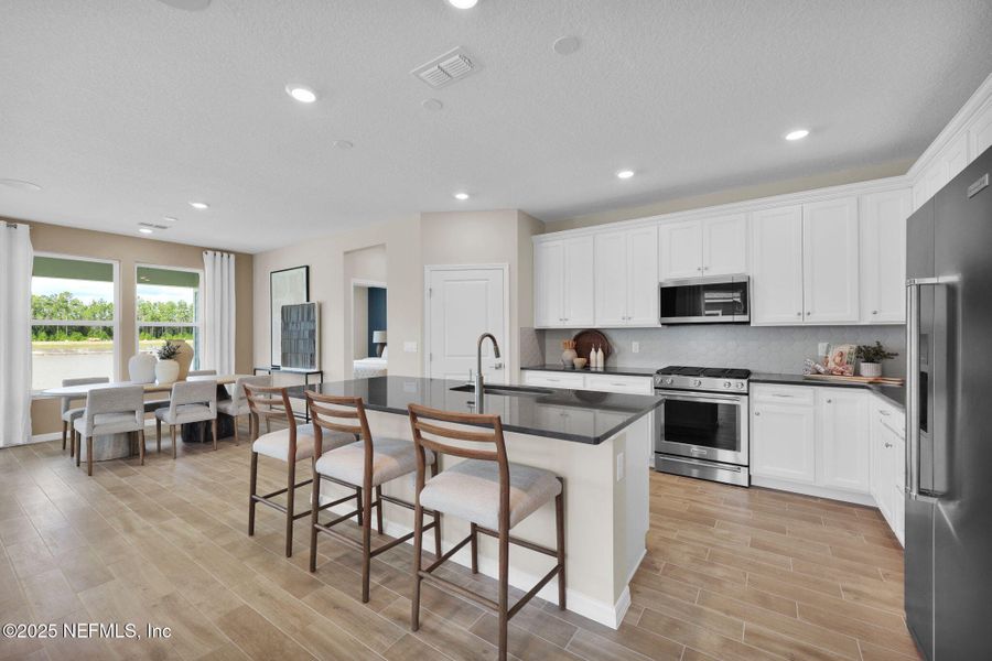 Furnished interior view inside a new home in Del Webb Wildlight, Yulee (Image 8). Furnished interior view inside a new home in Del Webb Wildlight, Yulee (Image 8).