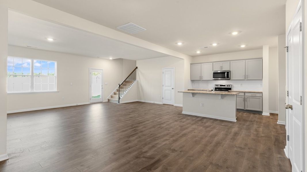 Spacious, unfurnished interior of a new home in The Grove at Matthews Landing, Fuquay Varina (Image 14).