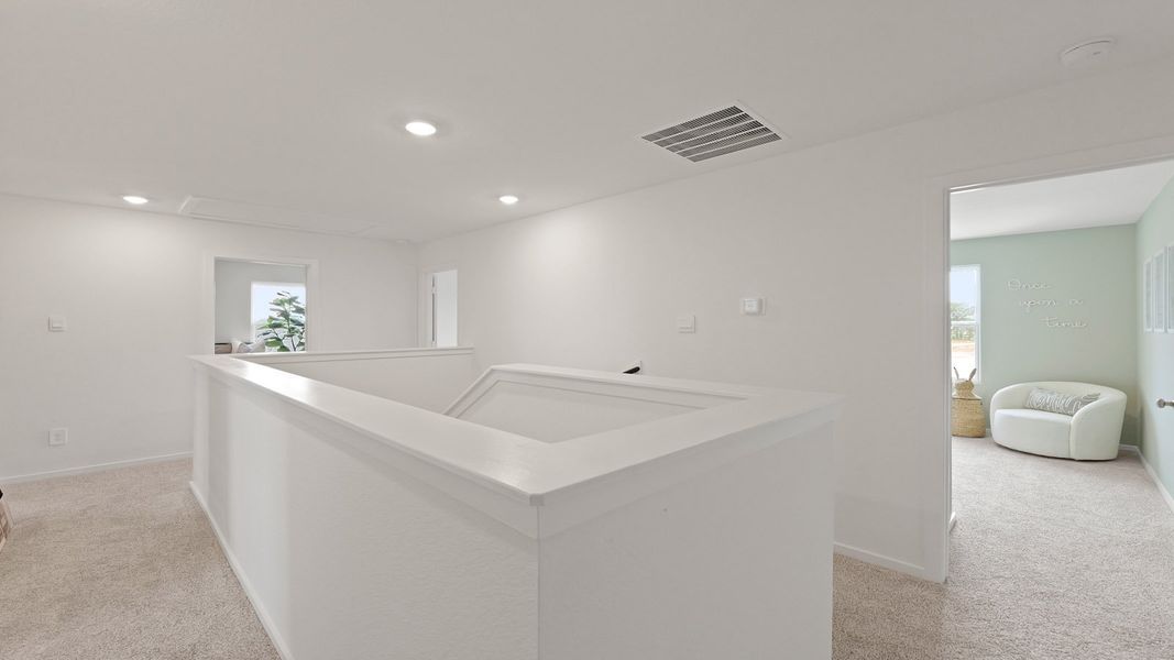 Representative furnished interior of a home built from the Franklin by D.R. Horton in Silverthorne, Conroe (Image 15).