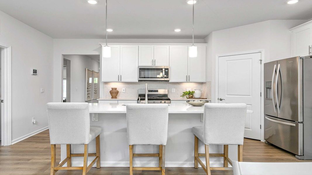 Furnished interior view inside a new home in The Villas at Kinsley, Jamestown (Image 13).