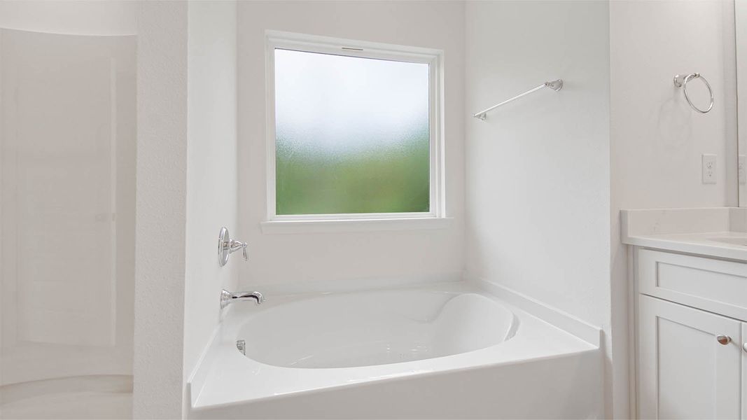 Representative furnished interior of a home built from the Kennedy by D.R. Horton in Bayside at Ward Creek, Panama City Beach (Image 13).