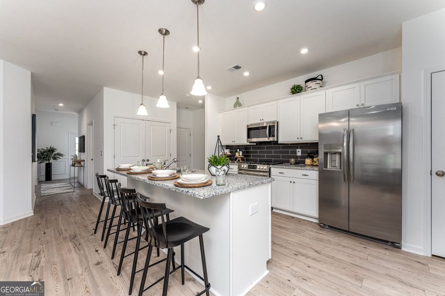 Furnished interior view inside a new home in Cobblestone Crossing Commons, Byron (Image 13).