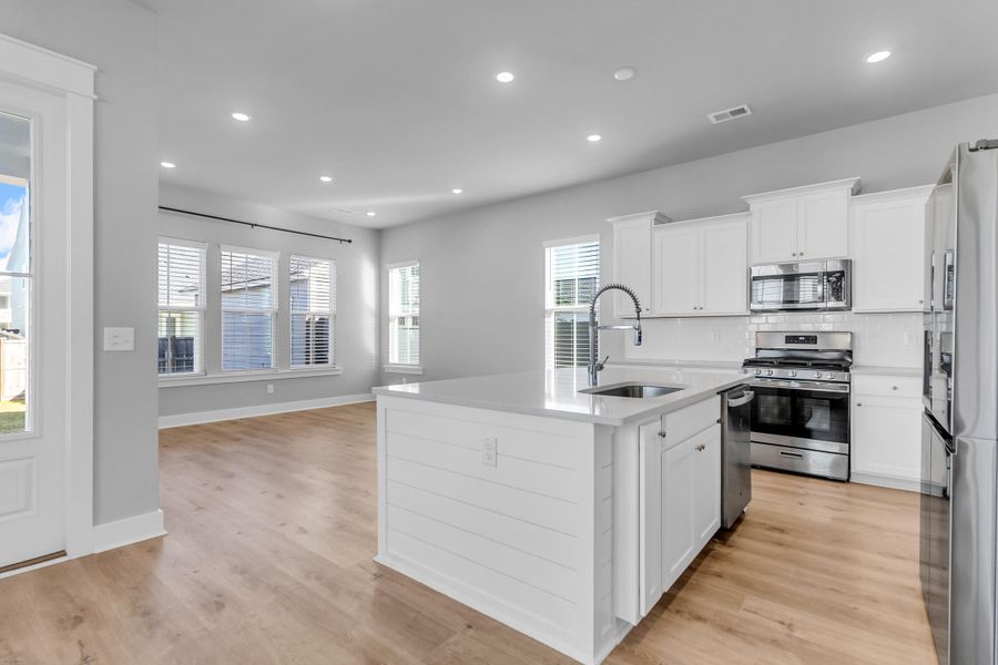 Furnished interior view inside a new home in Carnes Crossroads: Row Collection, Summerville (Image 12). Furnished interior view inside a new home in Carnes Crossroads: Row Collection, Summerville (Image 12).