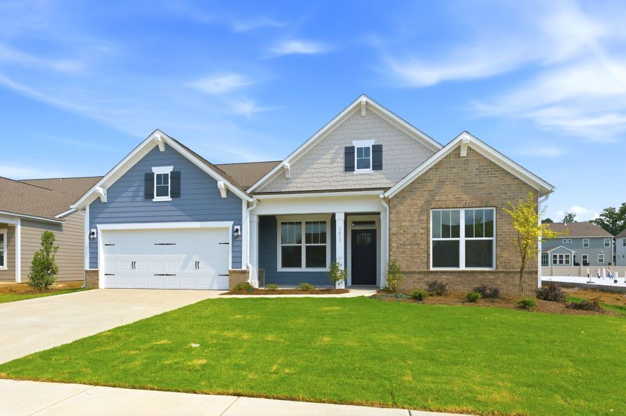 Front exterior of a new home in Encore at Harmony, Harrisburg, NC, highlighting curb appeal (Image 2). Front exterior of a new home in Encore at Harmony, Harrisburg, NC, highlighting curb appeal (Image 2).