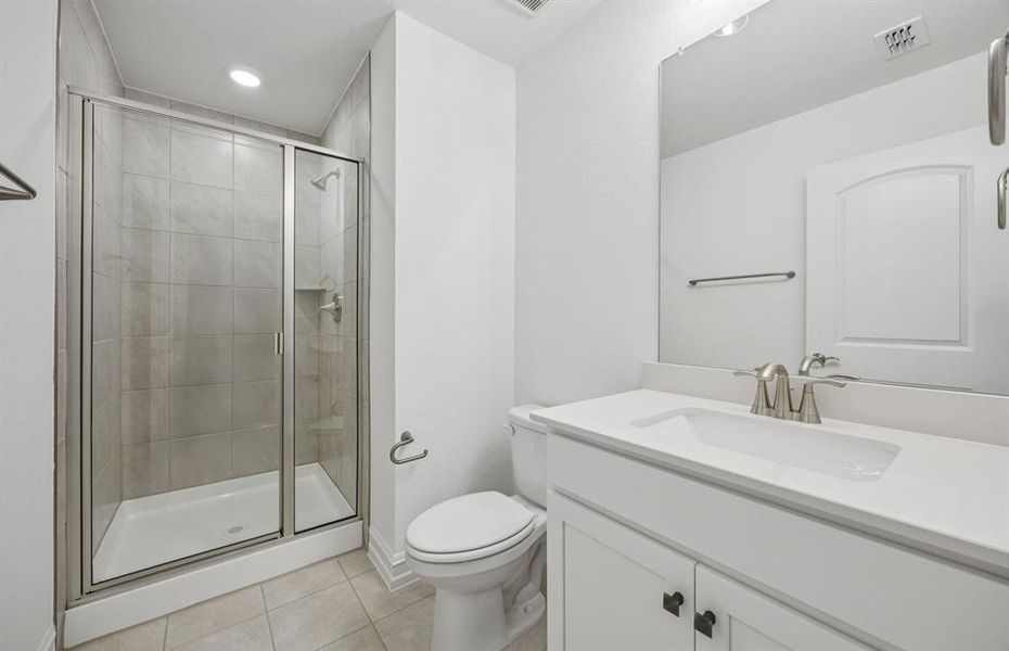 Spacious secondary bathroom with premium finishes