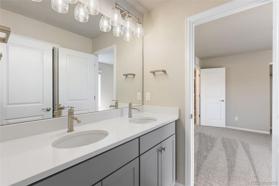 Furnished interior view inside a new home in Woodrose at Painted Prairie, Aurora (Image 13).