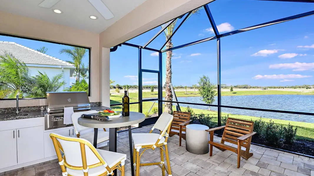 Exterior details and patio area of a home in SkySail Real Estate and Homes for Sale in Naples, FL - Neal Communities, Naples (Image 3). Exterior details and patio area of a home in SkySail Real Estate and Homes for Sale in Naples, FL - Neal Communities, Naples (Image 3).