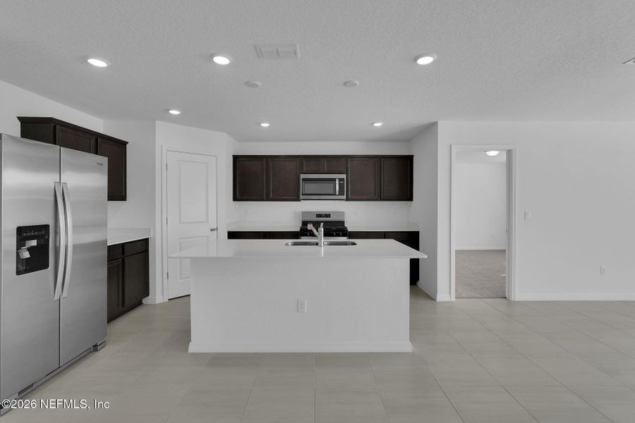 Furnished interior view inside a new home in Wells Landing, Jacksonville (Image 12).