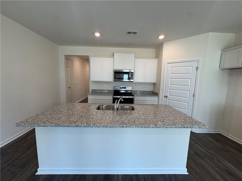 Furnished interior view inside a new home in Oakchase at Hampton, Hampton (Image 7).