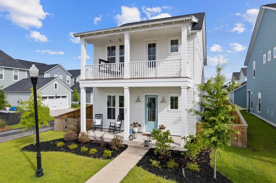 Front exterior of a new home in Carnes Crossroads, Summerville, SC, highlighting curb appeal (Image 25). Front exterior of a new home in Carnes Crossroads, Summerville, SC, highlighting curb appeal (Image 25).